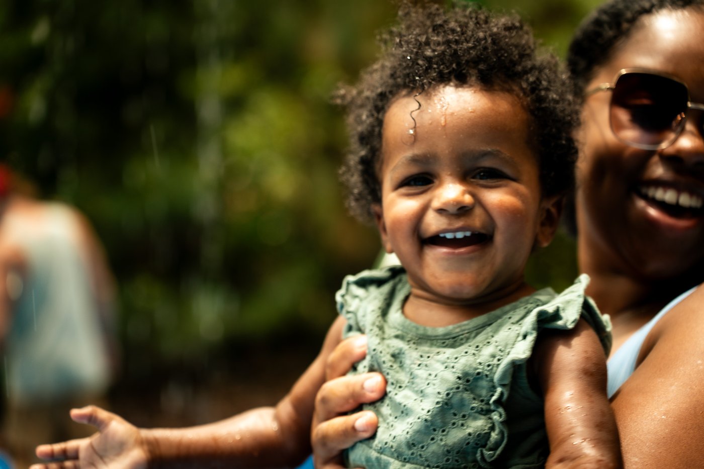 Baby laughing with mom at Universal Orlando