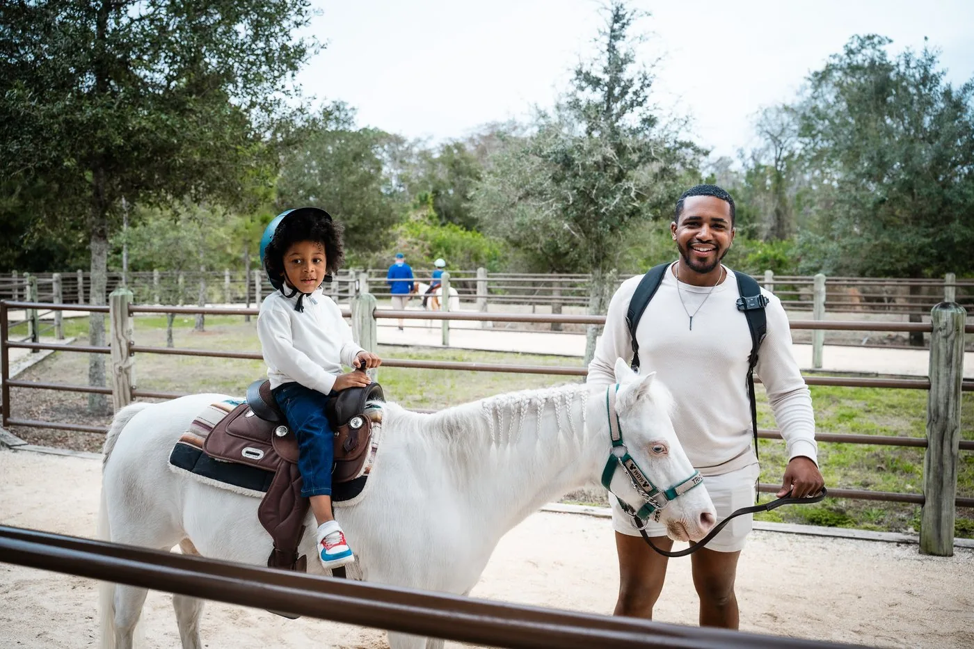 Roberson kid horseback riding at Disney