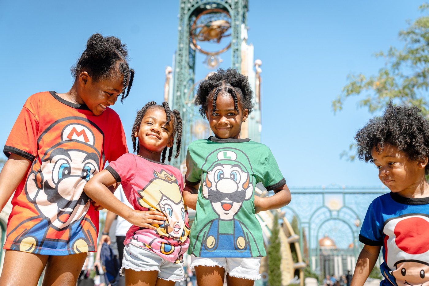 Roberson kids in Mario shirts at Epic Universe